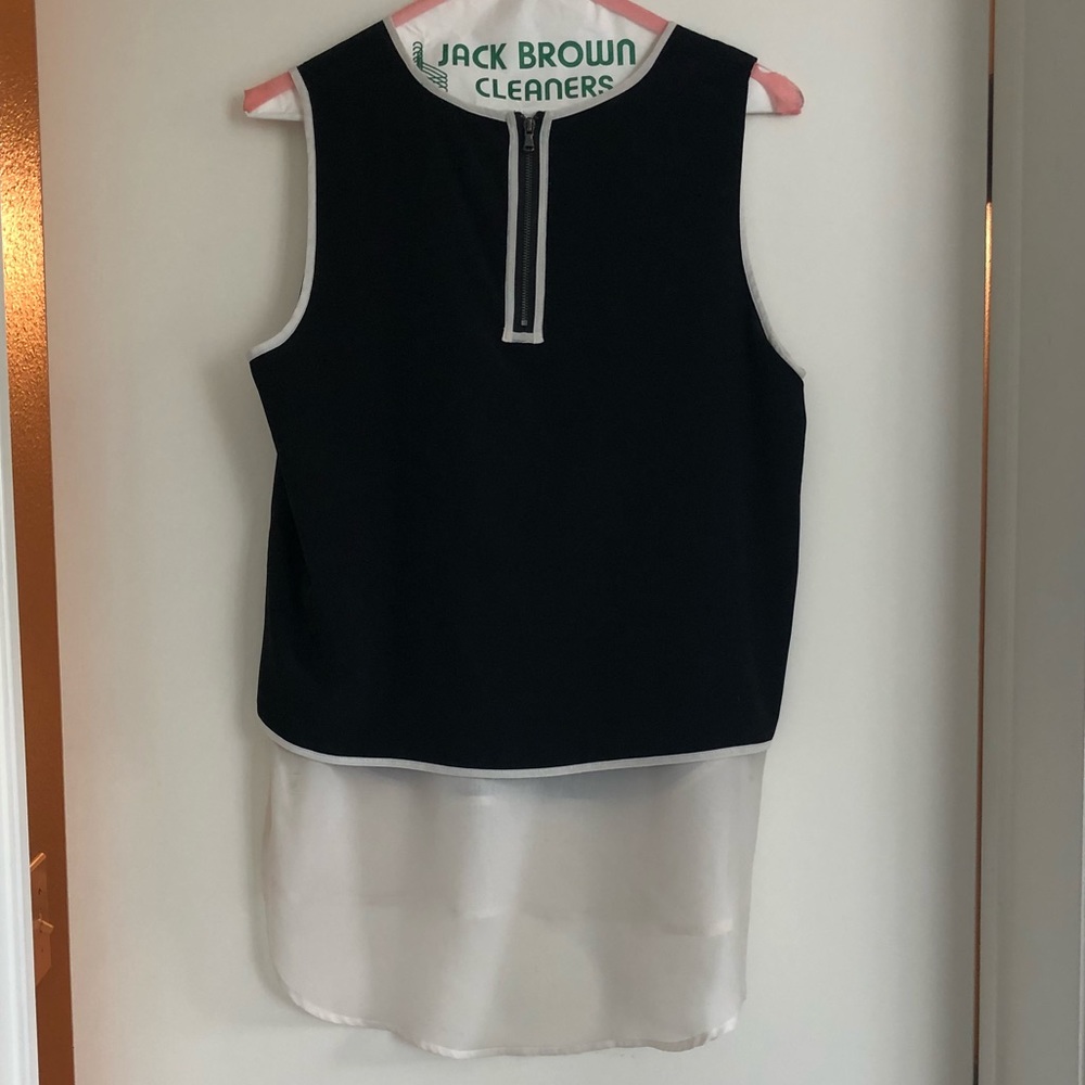 Sleeveless black and white top